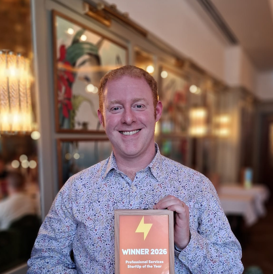 Tony McBride with the NI StartUp Awards Professional Services StartUp of the Year 2026 trophy